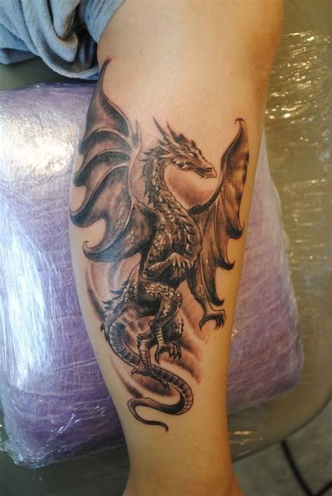 tatuaje dragon pierna|Tatuajes de dragones en la pierna